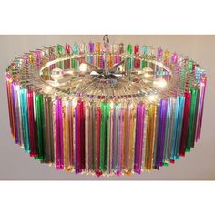 a multicolored chandelier hanging from the ceiling