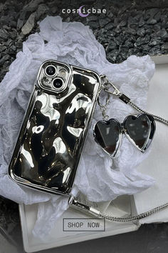 Upgrade your phone game with this Liquid Love chrome iPhone case. Complete with a removable chain strap and mirrored heart locket, it's the perfect statement piece. Heart Mirror, Drinkware Accessories, Bracelet Chain, Heart Locket, Metal Chain, Chain Strap