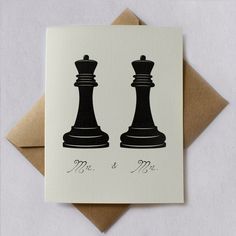 a card with a black chess piece on it and the words mr & mrs written in white ink