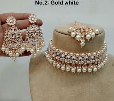 *Light Weight kundan choker necklace set. *Beautiful & Light in weight. *Necklace width: 1.5 inches (included drops) *Earrings length: 3.4 inches  (with drops)   *Earrings width- -1.2 inches Heavy White Wedding Choker, White Chandbali Kundan Necklace For Marriage, Heavy White Bridal Choker Necklace, White Heavy Chandbali Choker, White Meenakari Choker For Party, Heavy White Choker As Gift, Heavy White Bridal Necklace For Party, Festive Heavy White Choker, White Kundan Choker Necklace