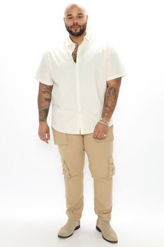 Available In Black, Khaki, Olive And Burgundy Button Closure Draw cord Zip Fly Side Hand Pockets Cargo Pockets Back Pockets Ankle Zipper Slim Fit 31 Inseam 98% Cotton 2% Spandex Imported | Mens Hunter Slim Cargo Pants in Khaki size 42 by Fashion Nova Men Jeans Pants, Jumpsuit Men, Khaki Fashion, Button Down Shirt Mens, Woven Top, Shop Mens Clothing, Mens Activewear, Short Sleeve Button Up, Lightweight Jacket