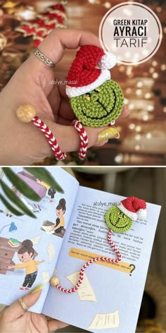 a hand holding an open book with crocheted items on it, and the pages are