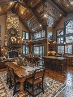 a large living room filled with furniture and a fire place in the middle of it