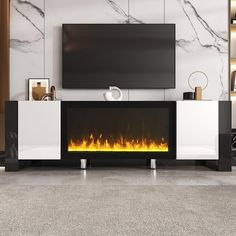 a living room with a television and fire place