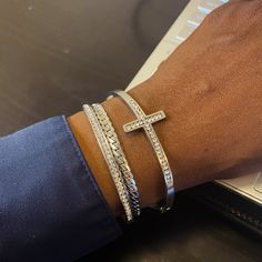 Enjoy the breathtaking beauty of the Grace bracelet stack. These bracelets are the perfect accessory and make it easy to reflect on your spirituality and love for yourself while adding a little flair to your outfit. When stacked together, they create a delicate sophisticated look. This bracelet stack includes - Faith Stainless Steel Cross Bracelet - Ninette Stainless Steel Bracelet with inlaid cubic zirconia - Herringone chain bracelet Fits wrists up to 6.5 inches Love For Yourself, Steel Cross, Silver Jewelry Design, Breathtaking Beauty, Onyx Bead, Cross Bracelet, The Grace, Bracelet Stack, Steel Bracelet