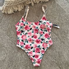 Victorias Secret One Piece Swimsuit, Floral Pattern With Shine Straps. Size Large, New With Tags Feminine White Bodysuit For The Beach, Summer Victoria's Secret Lined Bodysuit, Victoria's Secret One-piece Summer Bodysuit, Victoria's Secret Beachwear Bodysuit For Swimming, Fitted Victoria's Secret Bodysuit For Summer, Victoria's Secret One-piece Stretch Bodysuit, Victoria's Secret Summer Beachwear Bodysuit, Victoria's Secret Stretch One-piece Bodysuit, Victoria's Secret Stretch Bodysuit For Beach