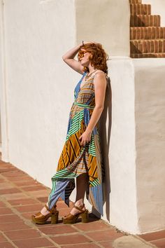 This luxe bohemian scarf dress is perfect for all-season styling. Wear alone in the summer, or over a long sleeve tee in the winter. Adjustable tie shoulder straps create versatility and size inclusion! Belt or use the included waist tie as a fabulous matching headpiece. Made from a soft and stunning mustard/teal paisley print bamboo blend jersey and lots of love! One size fits most up to size 22. Machine wash cold, gentle, and hang dry. Bohemian Scarf, Bohemian Scarves, Scarf Dress, Friends Fashion, In The Winter, Wholesale Fashion, Waist Tie, Paisley Print, Long Sleeve Tee