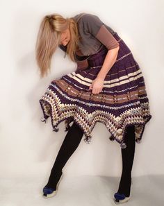 Keep yourself warm and stylish with this purple poncho/skirt. Colors: Royal purple, white, tan and some bluish details Length: 24.8 inches (63 cm) without polo neck Fits all sizes:S - XXXL Want something tweaked on this poncho, or would you like it in a different size? I love custom orders, so just send me a convo and we can arrange this to be made just for you! Casual Purple Skirt For Winter, Crocheted Dresses, Crochet Skirt Pattern, Turtleneck Poncho, Purple Crochet, Creative Knitting, Loom Knitting Patterns, Crochet Skirts, Crochet Dresses