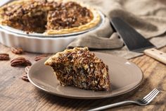 a slice of pecan pie on a plate