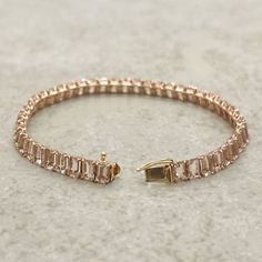 This Morganite Tennis Bracelet is perfect to match your Morganite Jewelry for Date Night or your Wedding Day!

Gems: Genuine AAA Peachy Pink Morganite, Emerald Cut, averaging 5x3mm.  Carat weight averages:
6” - 46 Morganites and 14.26 carats
7” - 49 Morganites and 15.19 carats
8” - 51 Morganites and 15.81 carats

All shapes, sizes and gemstones available upon request!
For those ordering in 18k Rose Gold, bracelet is 18k, the clasp is 14k for added strength. Priced accordingly.

See what’s includ Bracelet Emerald, Morganite Jewelry, Pink Morganite, Rose Gold Bracelet, Peachy Pink, Tennis Bracelet, Morganite, 18k Rose Gold, Emerald Cut