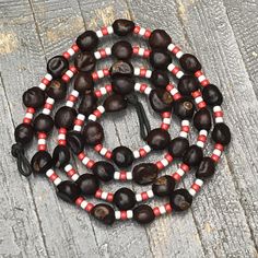 Handmade Beaded Garland Buckeye Football OSU Ohio State Buckeyes 6' Strand Buckeye Nut Crafts, Buckeye Garland, Buckeye Ornaments Diy, Crafts With Buckeyes, Ohio State Christmas Tree, Real Buckeye Crafts, Osu Crafts Diy Ohio State Buckeyes, Ohio State Buckeyes Bracelet, Buckeye Jewelry