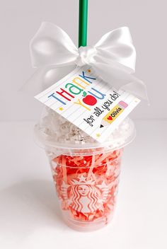 a starbucks cup filled with lots of candy