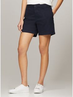 Tommy Hilfiger women's short. Made from soft, stretch fabric and cut in an easy fit, our go-to short is comfortable and flattering.  Material: 77% Cotton, 20% Reprocessed Cotton, 3% Elastane. Casual Mid-rise Bottoms By Tommy Hilfiger, Classic High-waisted Bermuda Shorts With Relaxed Fit, Classic High-waisted Bermuda Shorts, Solid Relaxed Fit Bermuda Shorts, Classic Solid Bermuda Shorts, Spring Bermuda Shorts With 5-inch Inseam And Relaxed Fit, Business Casual Spring Shorts, Classic Bermuda Shorts With 5-inch Inseam For Spring, Solid Color Relaxed Fit Bermuda Shorts