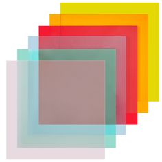 an assortment of different colored squares on a white background with one square in the middle