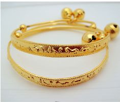 Handmade item from Thailand Materials: Brass, Gold Real 18k & 24K gold plated/Nickel free This is a set of two brand new 23K Thai gold new born anklet bracelet. They measure diameter 4.5-5.5 CM Circumference: 17 CM Adjustable Weight about: 13 grams The anklet can be enlarged so the feet of a baby can insert easily. The round ball is ringing FREE JEWELRY BAG WITH EVERY ITEM Description All gold plated jewelry was sent directly to us from the manufacturer in Bangkok This Unique Jewelry Is Bras Adjustable Gold Bracelet For Festive Occasions, Adjustable Gold Bracelet For Ceremonial Occasions, Traditional Gold Anklets With Adjustable Fit, Traditional Gold Adjustable Anklets, Traditional Gold Anklets Adjustable, Bell Anklet, Elephant Anklet, Crescent Moon Necklace Silver, Hummingbird Jewelry