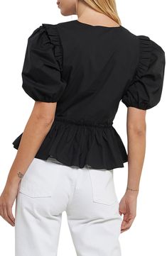 Ruffles on the shoulders enhance the puff sleeves of a charming cotton top made with more frill topping the gathered peplum. V-neck Short sleeves 100% cotton Hand wash, dry flat Imported Spring Black Puff Sleeve Top With Ruffles, Black Ruffled Puff Sleeve Top For Spring, Black Puff Sleeve Top With Ruffles For Spring, Black Ruffled Puff Sleeve Top, Cotton Ruffle Puff Sleeve Blouse, Cotton Puff Sleeve Blouse With Ruffles, Ruched Cotton Puff Sleeve Top, Cotton Blouse With Puff Sleeves And Ruffles, Fitted Cotton Puff Sleeve Top With Ruffles