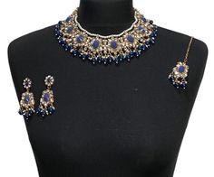 Handcrafted antique golden blue diamonte Indian wedding / bridal jewellery set. Set includes- Earrings  Collar necklace Tikka  Our collar necklace is adjustable with a dori at the back giving you a comfortable fit. It comes with elegant earrings with gem detail, tikka with hooks.  The glimmer of the diamonte gems with elegant pearl detail make this jewelry set a truly head turning piece, a must have for every jewellery box.  Our ethnic jewellery set harmoniously blends the allure of Pakistani, P Walima Jewellery, Wedding Jewelry Blue, Indian Jewelry Set, Blue Wedding Jewelry, Bridal Jewellery Set, Gold Wedding Jewelry, Pakistani Jewelry, Wedding Bridal Jewellery, Indian Jewelry Sets