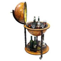 an old fashioned bar cart with wine glasses on it