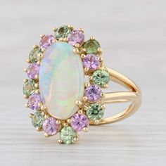 Luxury White Multi-stone Gemstones, Luxury Multi-stone Opal Ring In 14k Gold, Luxury Yellow Gold Opal Ring With Accent Stones, Elegant Multicolor Cabochon Opal Ring, Formal Multicolor Opal Ring, Formal Multicolor Opal Gemstone Ring, Elegant Multicolor Opal Ring, Luxury Multi-stone Gemstones In 14k Gold, Fine Jewelry Multicolor Multi-stone Opal Ring