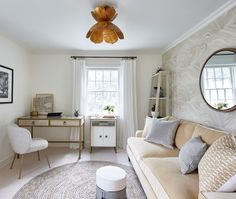 the living room is clean and ready for guests to use it as a work space