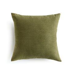 a green pillow on a white background