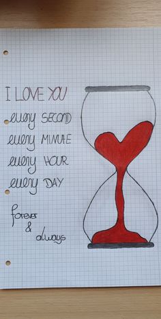 a note with an hourglass drawn on it and the words, i love you