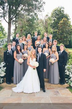 a large group of people in formal wear