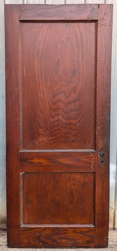 an old wooden door with no glass on it