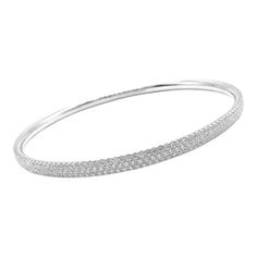 Tiffany & Co Metro 18k White Gold Full Diamond Three Row Bangle Bracelet $22,300   Retail Price: $22,300   Metal: 18k White Gold  Size: Medium 6.25"  Weight: 22.3 grams  Width: 4mm  Stones: Round Brilliant Cut Diamonds VS1 clarity, G color 2.98ct  Hallmarks: Tiffany&Co Au750 Belgium  Please reference the dimensions in the description for the best approximate dimensions. Luxury Bangle Bracelet With Pave Setting, Timeless Jewelry Bangle With Pave Setting, Timeless Bangle With Pave Setting For Formal Occasions, Fine Jewelry Bangle With Pave Setting, Elegant Pave Setting Bangle Jewelry, Fine Jewelry White Gold Bracelet With Pave Setting, Formal White Gold Bracelets With Pave Setting, Timeless Pave Setting Bracelets, Timeless Gold Bracelet With Pave Setting