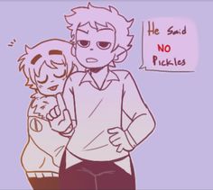 two people standing next to each other in front of a sign that says he said no pickles