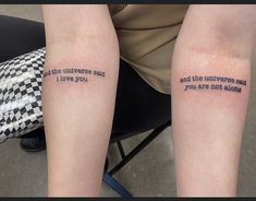 two people with tattoos on their legs that say, and the universe said i love you