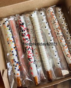 there are many different types of toothbrushes in the box with sprinkles on them