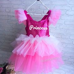 Hair Accessory is a Gift 🎁| Free and Fast Shipping ✈️ | Quality Hand Workmanship 💪🏻 Handmade Dress Up Costumes Take your birthday celebration to new heights of glamor and elegance with our perfectly luxurious Personalized Birthday Pink Sequin Dress. This stunning handmade dress is designed to make you feel like a princess when you're the center of attention on your special day. * The straps of our dress are not fixed, there is an adjustable elastic at the back. This gives you the advantage of Hot Pink Sparkly Dress, Dress Mini Prom, Pink Sparkly Dress, Pink Toddler Dress, Mini Prom Dress, Photo Shoot Dress, Princess Evening Dress, Pink Baby Dress, Pumpkin Dress