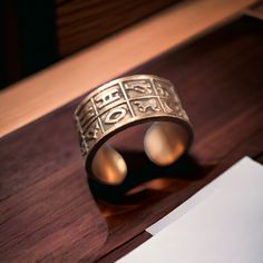 If You Can't Stop Thinking About ItBUY IT ;) Beautifully Crafted Adjustable Solid Brass Ring/Band with a Beautiful Finish for [Ancient Egyptian Hieroglyphics]Very Elegant, Unique & Simple Jewellery that will bring a real chic touch to your style. ✩  Materials:    (Brass) Lead and nickel free ✩  Size:             6.5 US[ADJUSTABLE] ✩  Width:          1.5 cm          [0.6" Inches] ✩  Weight:        [5] grams of Weight [Approx.] ✩  All our Jewels arrive Beautifully Packaged in a Gift Pouch ready fo Ancient Egyptian Hieroglyphics, Simple Jewellery, Egyptian Hieroglyphics, Oxidized Brass, Cant Stop Thinking, Brass Ring, Gift Pouch, Simple Jewelry, Ring Band