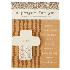 a card with a cross on it and the words prayer for you written in white