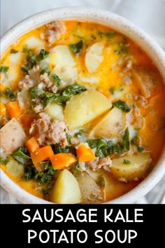 sausage kale potato soup in a white bowl with text overlay that reads sausage kale potato soup