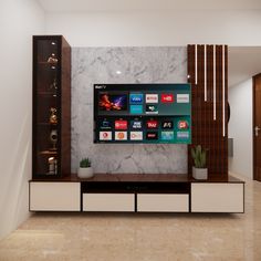 the television is mounted on the wall in the living room, and it's surrounded by shelves