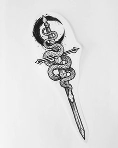 a sticker with a dagger and snake wrapped around it's head, on top of a white surface