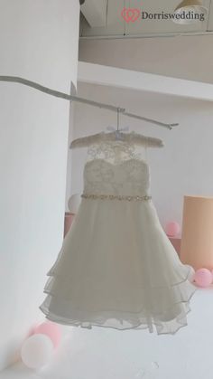 🌼💖 Pure Elegance for a Sacred Moment! 🌸✨ This adorable short A-line First Communion flower girl dress is a vision of charm and grace. With a lace bodice, layered organza skirt, and a delicate beaded belt, it adds a touch of sophistication to this special occasion. Available in 60 captivating colors and 14 sizes, you can find the perfect fit for your little flower girl. Watch her radiate in this enchanting gown on her sacred day! 💒💫 #FirstCommunionDress #AdorableFashion #SacredOccasion Sleeveless Embellished Princess Dress For Spring, Embellished Sleeveless Princess Dress For Pageant, Sleeveless Embellished Princess Dress For Pageant, Embellished Sleeveless Dress For Dress-up, Princess Style Embellished Sleeveless Dresses, Princess Style Sleeveless Embellished Dresses, Fitted Princess Sleeveless First Communion Dress, Fitted Sleeveless Princess First Communion Dress, Embellished Sleeveless Dress For Pageant