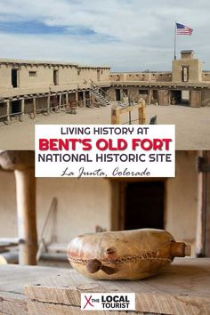 an old fort with a sign that says living history at ben's old fort national historic site