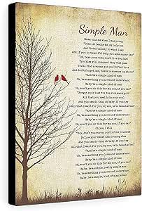 a tree with two birds sitting on it next to a poem that reads, simple man