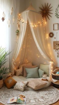 a room with a bed covered in lights and pillows