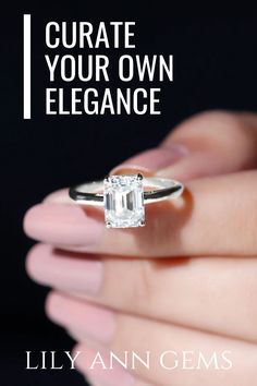 a woman's hand holding an engagement ring with the words, create your own elegance