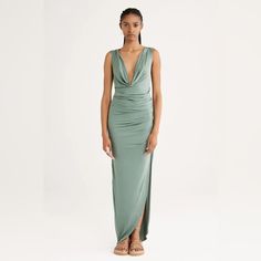 Exude A Timeless Elegance In The Stunning Silhouette Of Our Enya Maxi Dress. Other Features Include: Deep Draped Neckline Flattering Tucks And Gathers Side Split Crafted From A Luxe Bamboo Jersey Green Draped Maxi Dress For Gala, Green Ruched Maxi Dress For Gala, Green Ruched Dress For Gala, Green Floor-length Ruched Dress, Green Sleeveless Pre-draped Maxi Dress, Green V-neck Midi Dress For Gala, Green Draped Dress For Gala, Green Pre-draped Evening Maxi Dress, Pre-draped Ruched Green Dress