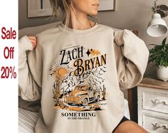 American Heartbreak, Something In The Orange, Cowgirl Vintage, Emily Brontë, Orange Sweatshirt, Country Music Shirts, Emily Bronte, Zach Bryan, Vintage Cowgirl