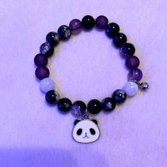 Black And White Panda Bracelet Trendy Black Round Bracelets, Trendy Black Round Bracelet, Trendy Black Adjustable Charm Bracelet, Trendy Adjustable Black Charm Bracelet, Casual Black Round Stretch Bracelet, Trendy Handmade Black Charm Bracelet, Black Novelty Bracelet Jewelry, Adjustable Black Charm Bracelet, Trendy, Panda Ring