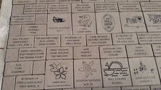 the names of many different people are engraved on the cement blocks in front of each other