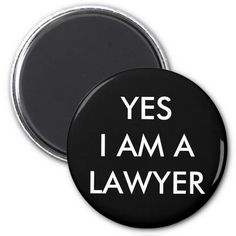 a black and white button with the words yes i am a lawyer