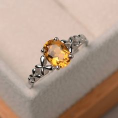 This ring features a 6*8 mm oval cut natural citrine ,and sterling silver finished with rhodium. Customization is available. It is made by hand, and it will take about 7 days to finish the ring after your payment is completed. Main stone: natural citrine Main stone weight: Approx 1.14 ct Metal type: sterling silver finished with rhodium Accent stone: none Customization is available, I also can make it with 14k solid gold (white or yellow or rose) and diamond accent stone, just feel free to conta Solitaire Oval Engagement Ring, Peridot Rings, Emerald Cut Solitaire Ring, Original Engagement Rings, November Birthstone Ring, Mystic Topaz Ring, Pear Cut Engagement Rings, Green Amethyst Ring, Oval Cut Engagement Ring