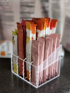 several bars of different colors in a holder